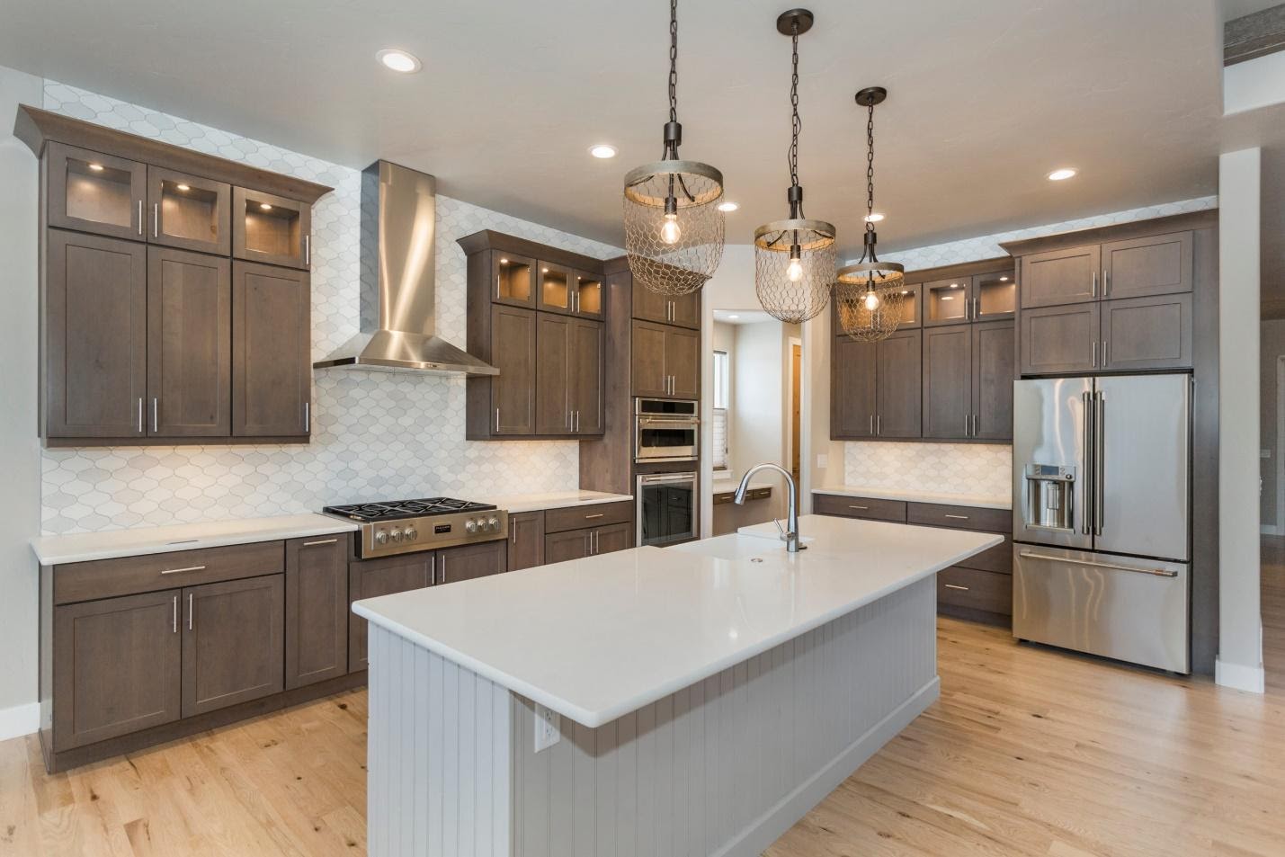 kitchen interior, taupe cabinets and white island